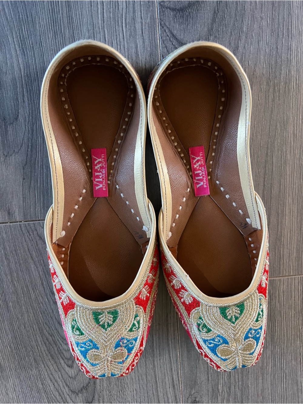 Vijay Cream Embroidered Slip-On Flats with Red, Blue & Green Accents